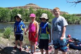 Four kids smiling